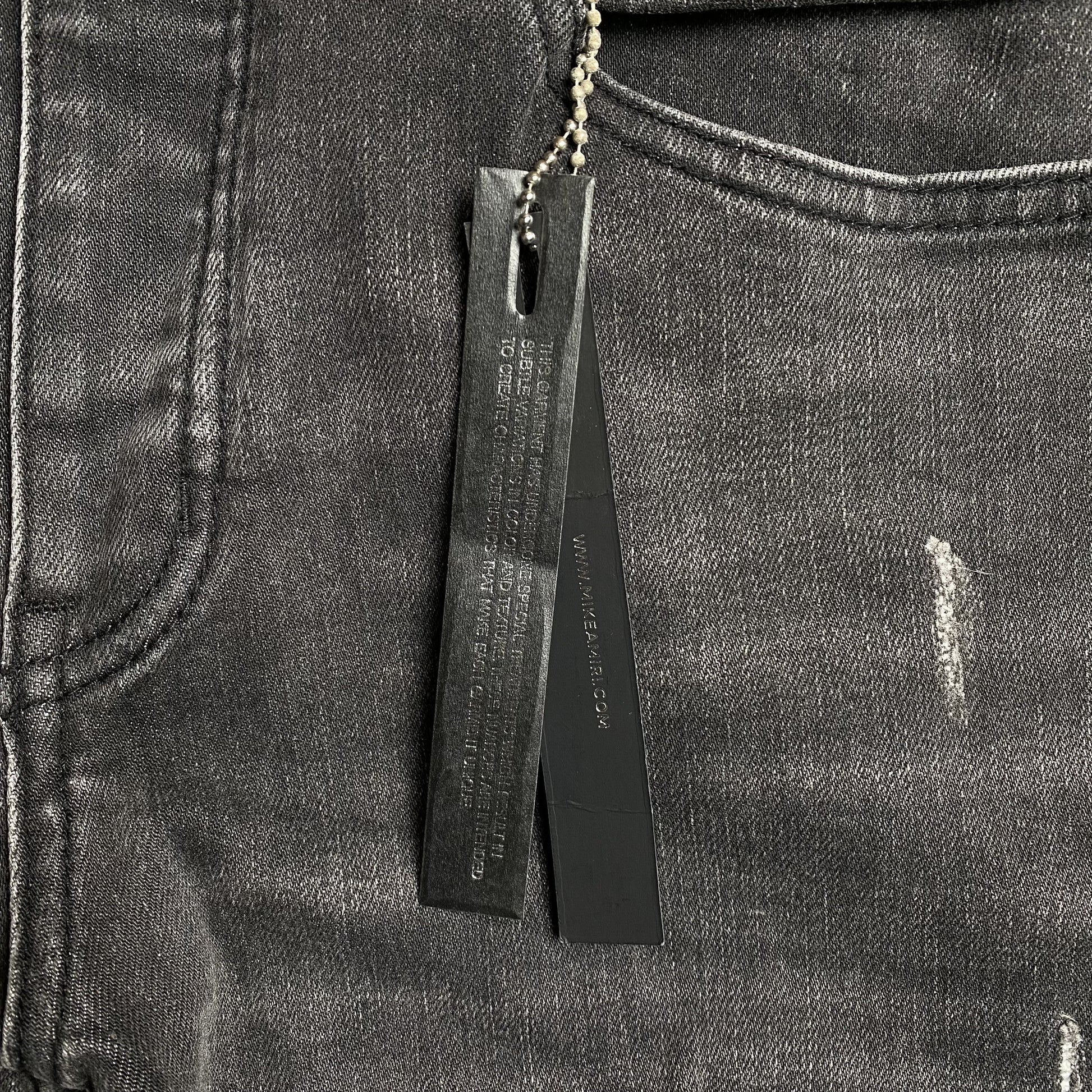 AMIRI SLASH SLIM JEANS