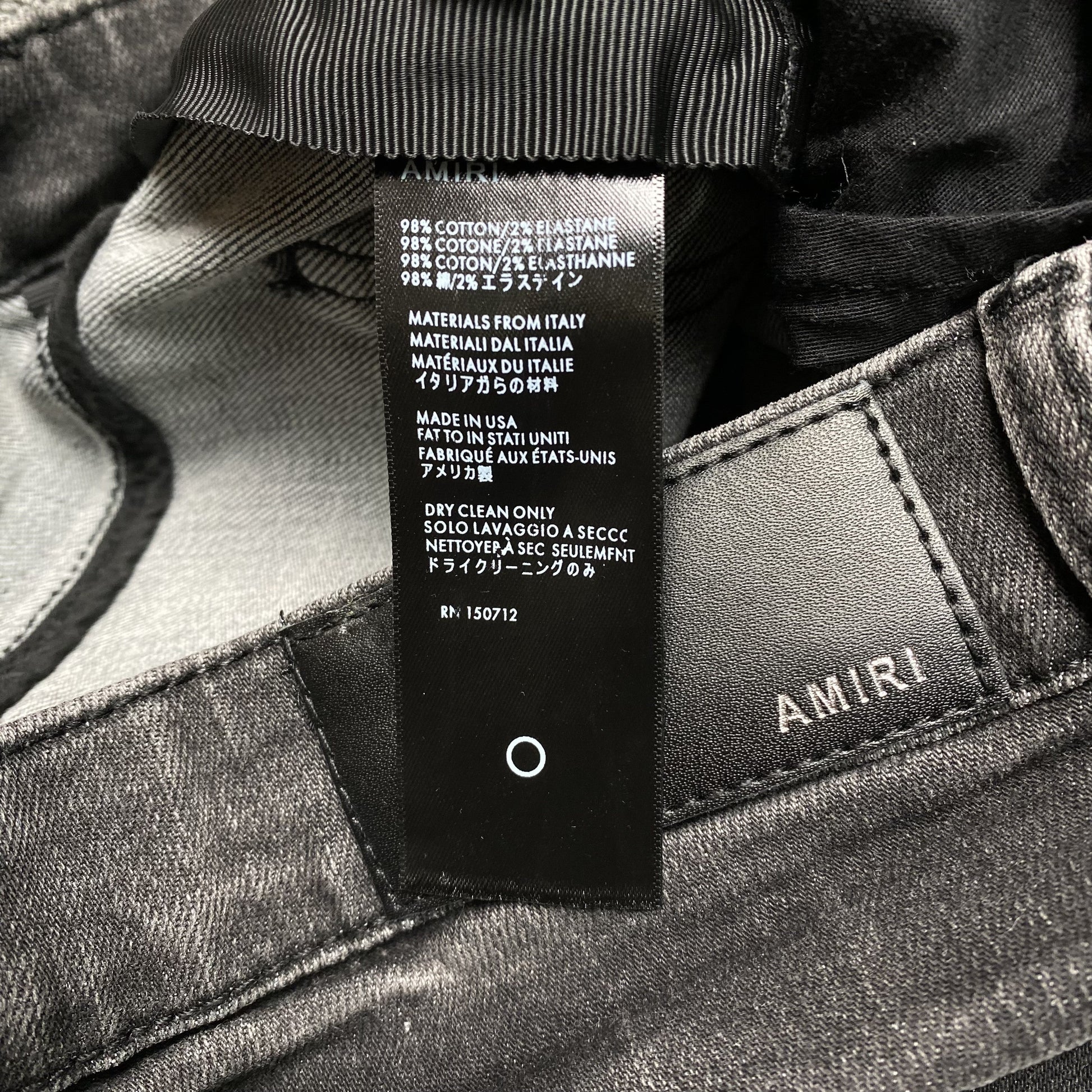 AMIRI SLASH SLIM JEANS